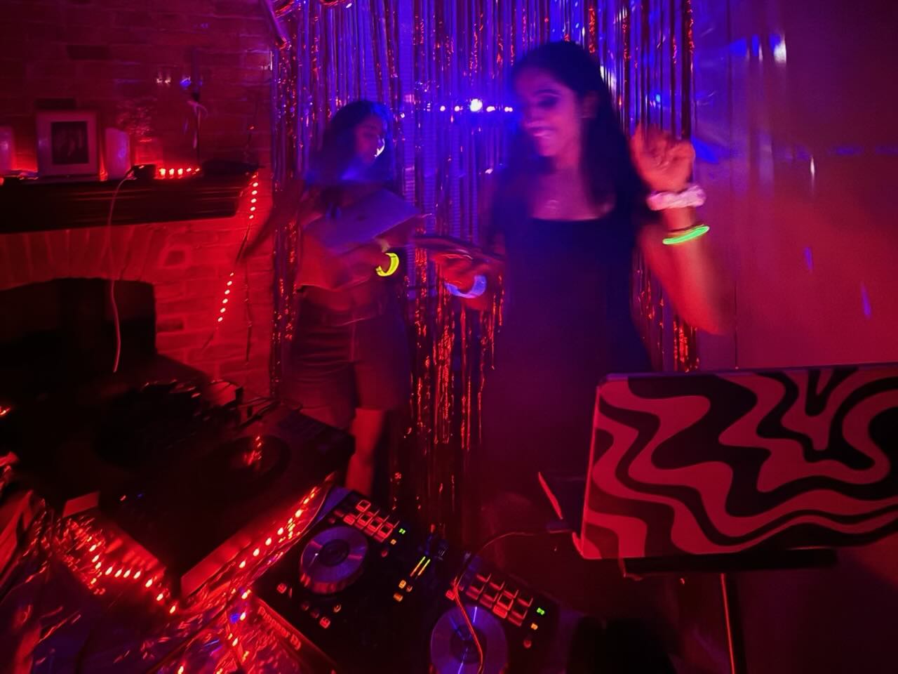 DJ Xhama performing at an outdoor event